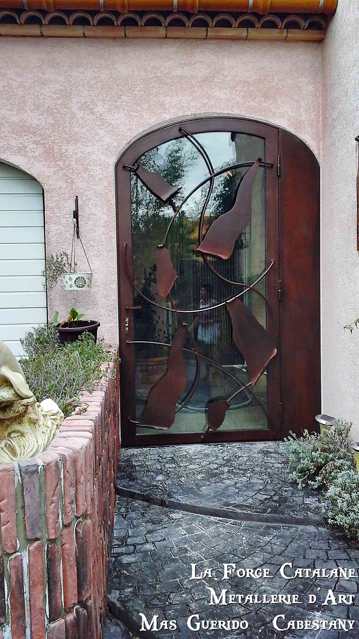 porte entree vitree rondin decoupe laser La Forge Catalane Cabestany.jpg